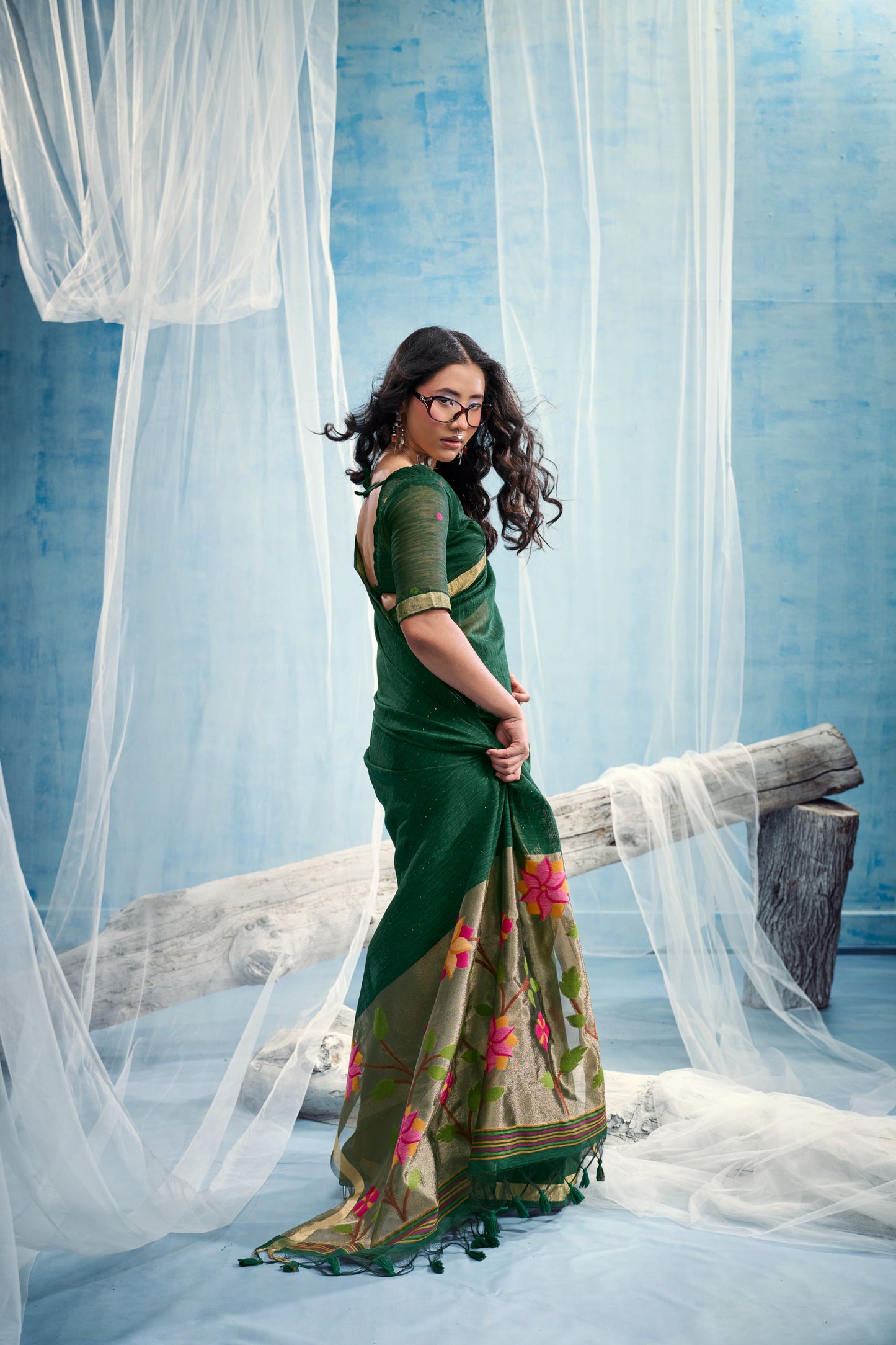 Bottle Green Linen Organza Saree with Floral Organza Pallu & Zari Border