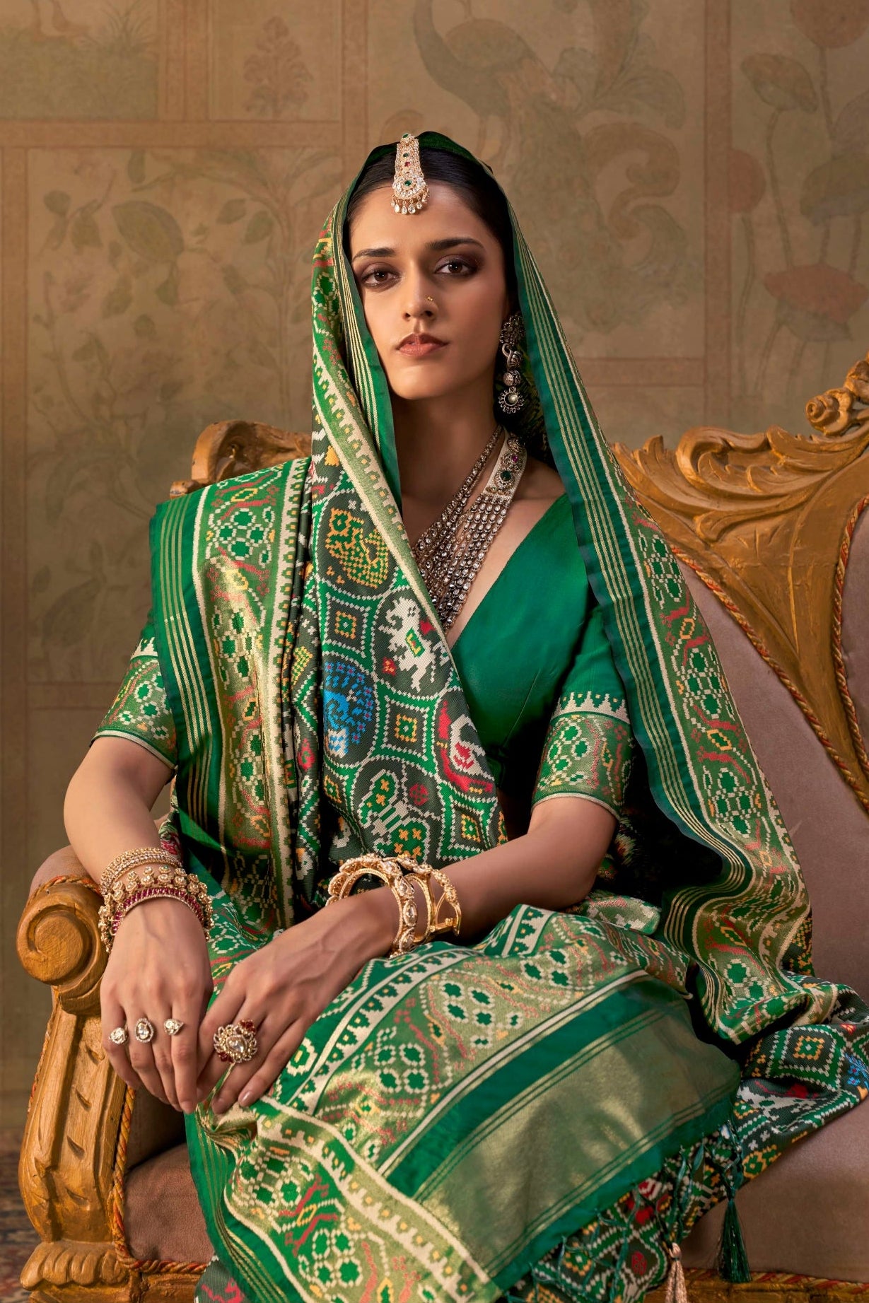 Dark Green Banarasi Silk Patola Saree with Rich Weave & Heritage Motifs