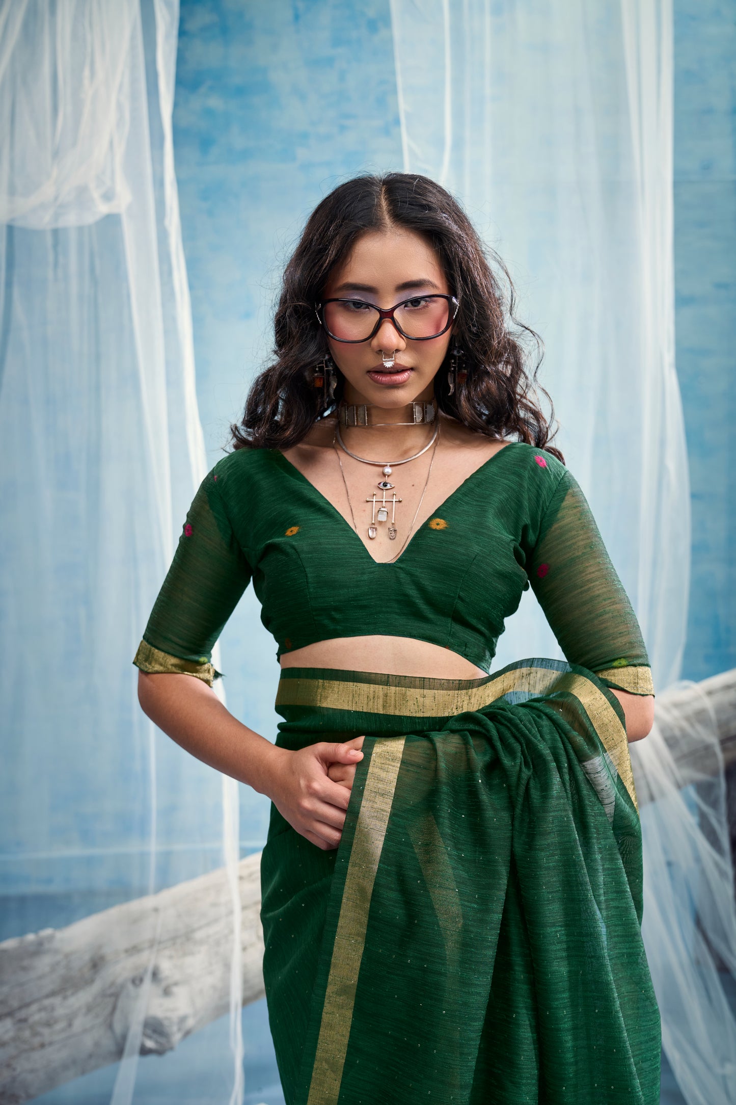Bottle Green Linen Organza Saree with Floral Organza Pallu & Zari Border