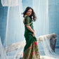 Bottle Green Linen Organza Saree with Floral Organza Pallu & Zari Border