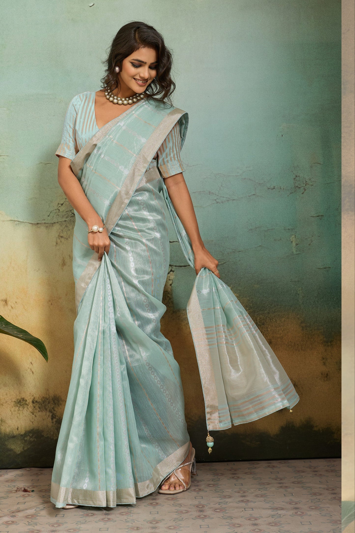 Mint Green Organza Silk Saree with Subtle Zari Stripes