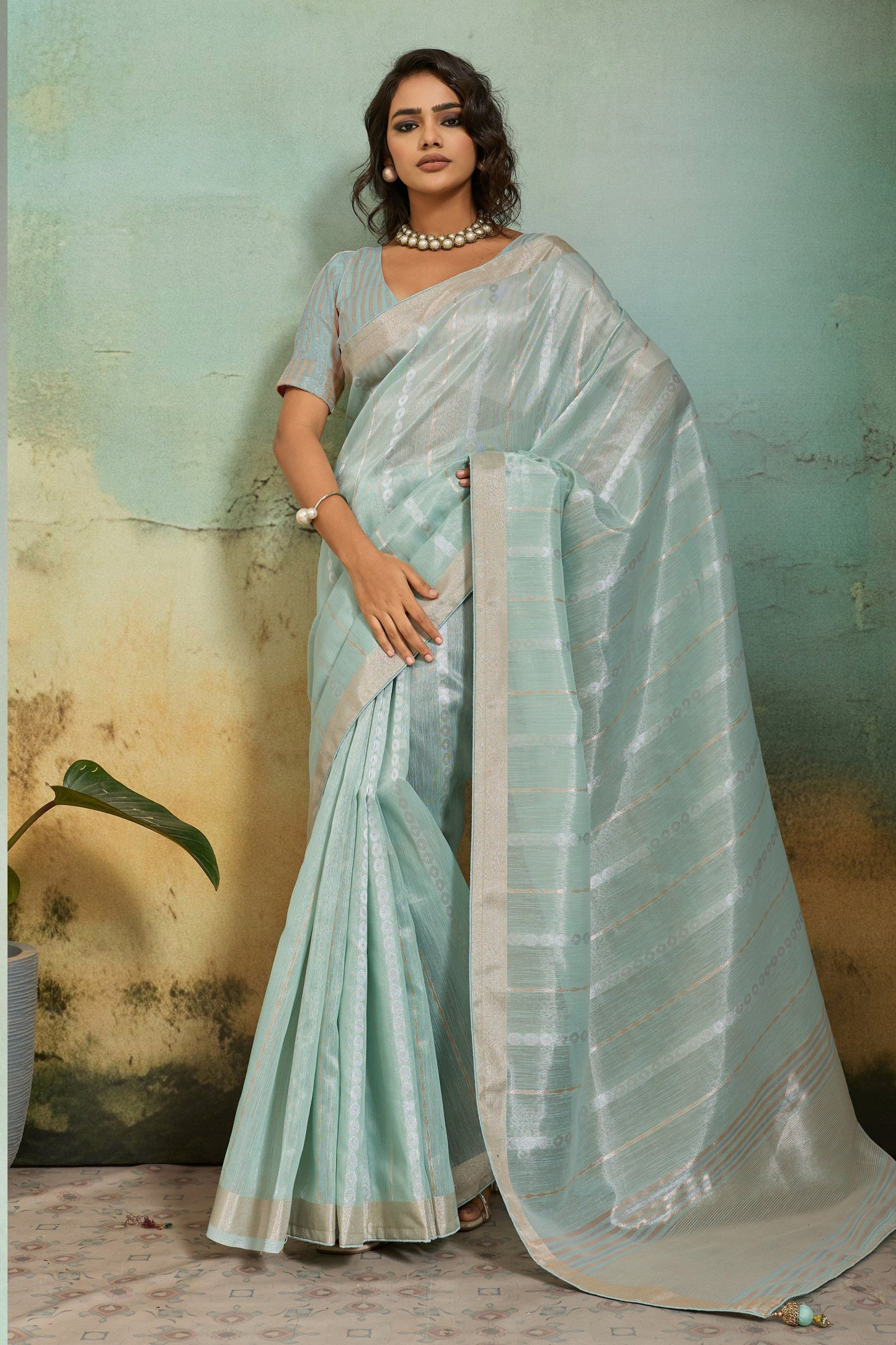 Mint Green Organza Silk Saree with Subtle Zari Stripes