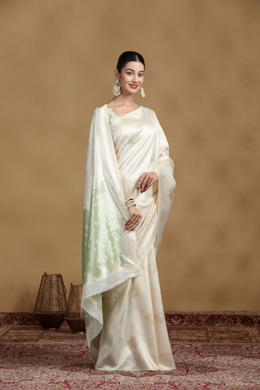 Off-White Banarasi Silk Saree with Subtle Pastel Green Border
