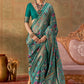 Rama Green Banarasi Silk Patola Saree with Rich Weave & Heritage Motifs