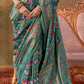 Rama Green Banarasi Silk Patola Saree with Rich Weave & Heritage Motifs