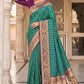 Rama Green Banarasi Silk Saree with Meenakari Paithani Pallu and Deep Purple Blouse